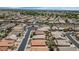 Expansive aerial view showcases a well-maintained residential neighborhood with lush landscaping and a community cul-de-sac at 18089 W Weatherby Dr, Surprise, AZ 85374