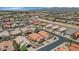 Aerial view of residential neighborhood with mountains at 18089 W Weatherby Dr, Surprise, AZ 85374