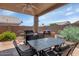 Backyard with outdoor dining at 18089 W Weatherby Dr, Surprise, AZ 85374