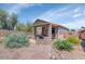 Backyard with gravel and covered patio at 18089 W Weatherby Dr, Surprise, AZ 85374