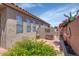 Exterior shot of backyard with floral at 18089 W Weatherby Dr, Surprise, AZ 85374