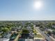 Aerial view of the residential lot with mature landscaping in a sunny suburban neighborhood at 1909 E Bethany Home Rd, Phoenix, AZ 85016
