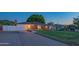 Cozy brick home featuring a well-maintained lawn and updated windows at 1909 E Bethany Home Rd, Phoenix, AZ 85016
