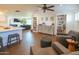 Open living area with a kitchen island, comfortable seating, and built-in bookshelves at 1909 E Bethany Home Rd, Phoenix, AZ 85016