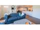 The living room showcases open access to the front door and an additional living and kitchen area at 1909 E Bethany Home Rd, Phoenix, AZ 85016