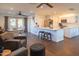 Inviting living room open to a modern kitchen, complete with ample seating and natural light at 1909 E Bethany Home Rd, Phoenix, AZ 85016