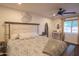Main bedroom boasts a comfortable bed, decorative elements, and a window for natural light at 1909 E Bethany Home Rd, Phoenix, AZ 85016
