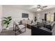 Well-appointed living room features stylish furniture, contemporary design, and a relaxing ambiance at 19685 N Star Ridge Dr, Sun City West, AZ 85375