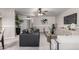 Stylish living room offers a mix of textures, elegant furnishings, and plenty of natural light at 19685 N Star Ridge Dr, Sun City West, AZ 85375