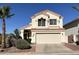 Charming two-story home with a well-manicured lawn and classic architectural details, a true curb appeal at 19943 N 77Th Ave, Glendale, AZ 85308