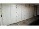 Garage with floor-to-ceiling storage cabinets at 19943 N 77Th Ave, Glendale, AZ 85308