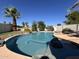 Inviting backyard pool surrounded by lush landscaping, perfect for outdoor relaxation and entertainment at 19943 N 77Th Ave, Glendale, AZ 85308