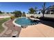 Lush pool and deck area perfect for relaxing at 19943 N 77Th Ave, Glendale, AZ 85308