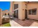 Inviting back patio with stone flooring and comfortable seating, perfect for outdoor relaxation at 2019 W Lemon Tree Pl # 1185, Chandler, AZ 85224