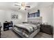 Comfortable bedroom featuring neutral tones, soft lighting, and a ceiling fan at 2019 W Lemon Tree Pl # 1185, Chandler, AZ 85224