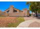 Side exterior view of house with landscaping and pathway at 2019 W Lemon Tree Pl # 1185, Chandler, AZ 85224