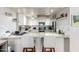 Stylish kitchen with granite countertops, white cabinets, and modern stainless steel appliances at 2019 W Lemon Tree Pl # 1185, Chandler, AZ 85224