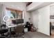 Well-lit home office featuring a large window, computer setup, and office chair at 2019 W Lemon Tree Pl # 1185, Chandler, AZ 85224