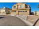 Inviting two-story home featuring a two-car garage and charming curb appeal with desert landscaping at 2254 E University Dr # 4, Mesa, AZ 85213