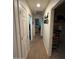 Hallway leading to bedroom, bathroom and laundry room at 2254 E University Dr # 4, Mesa, AZ 85213