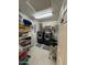 Organized laundry room featuring a full size washer and dryer with shelving at 2254 E University Dr # 4, Mesa, AZ 85213