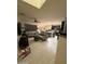 Open-concept living room flowing into a modern kitchen and dining area, with neutral decor at 2254 E University Dr # 4, Mesa, AZ 85213