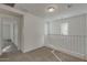 Upstairs loft area with carpet and natural light from the windows at 2254 E University Dr # 4, Mesa, AZ 85213