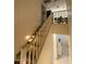 Carpeted stairway with white railing, leading to upper level at 2254 E University Dr # 4, Mesa, AZ 85213