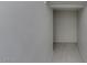 A walk-in closet with neutral paint, and wood-look tile at 2254 E University Dr # 4, Mesa, AZ 85213