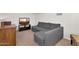 Finished basement features a comfortable seating area with TV at 2333 E Southern Ave # 2016, Tempe, AZ 85282
