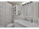 Bathroom with updated vanity, marble countertop and updated storage at 2333 E Southern Ave # 2016, Tempe, AZ 85282