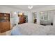 Bright bedroom features built in storage, en suite bathroom and closet with sliding mirror doors at 2333 E Southern Ave # 2016, Tempe, AZ 85282