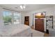 Bright bedroom with natural light, a ceiling fan, and warm wooden furnishings at 2333 E Southern Ave # 2016, Tempe, AZ 85282