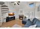 Stylish living room showcasing a fireplace, spiral staircase, and a comfortable seating area at 2333 E Southern Ave # 2016, Tempe, AZ 85282