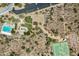 Expansive aerial view of the community amenities, including the pool, park, tennis court, and basketball court at 2638 W Sat Nam Way, Phoenix, AZ 85086