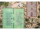Aerial view featuring tennis and basketball courts surrounded by desert landscaping at 2638 W Sat Nam Way, Phoenix, AZ 85086