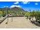Beautiful sand volleyball court with mountain views, nestled within desert landscape at 2638 W Sat Nam Way, Phoenix, AZ 85086