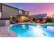 Beautiful backyard with swimming pool, patio area, and lush landscaping, perfect for outdoor enjoyment at 3031 S Cortland --, Mesa, AZ 85212