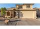 Beautiful single-Gathering home featuring a 2-car garage, desert landscaping and an arched entryway at 3031 S Cortland --, Mesa, AZ 85212