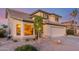 Charming front exterior of a two-story home with a well-maintained yard, two car garage, and lovely curb appeal at 3031 S Cortland --, Mesa, AZ 85212