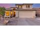 Charming two-story home with a well-maintained lawn and a spacious two car garage at 3031 S Cortland --, Mesa, AZ 85212