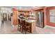 Well-lit kitchen featuring an island, stainless steel appliances, and wood cabinetry at 3031 S Cortland --, Mesa, AZ 85212