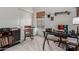 Bright home office featuring a workspace, a window, a rocking chair and neutral carpet at 3031 S Cortland --, Mesa, AZ 85212