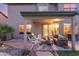 Cozy covered patio area with comfortable seating, perfect for outdoor entertaining and relaxation at 3031 S Cortland --, Mesa, AZ 85212