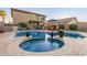 Relaxing backyard pool and spa with lounge chairs, a covered patio, and lush landscaping, perfect for outdoor entertaining at 3031 S Cortland --, Mesa, AZ 85212