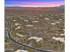 Aerial view of desert homes nestled in a serene landscape, highlighting the community's layout at 30600 N Pima Rd # 61, Scottsdale, AZ 85266
