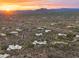 Sunrise aerial view of luxury homes in a sprawling desert community, showcasing peaceful living at 30600 N Pima Rd # 61, Scottsdale, AZ 85266