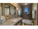 Beautiful bathroom showcasing modern fixtures, neutral tilework, and bright natural light at 30600 N Pima Rd # 61, Scottsdale, AZ 85266