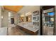 Bright bathroom featuring dual sinks, stone floors, modern lighting, and an open design at 30600 N Pima Rd # 61, Scottsdale, AZ 85266