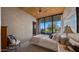 Inviting bedroom with scenic backyard views from the bedroom window, showing views of the beautiful outdoor landscaping at 30600 N Pima Rd # 61, Scottsdale, AZ 85266